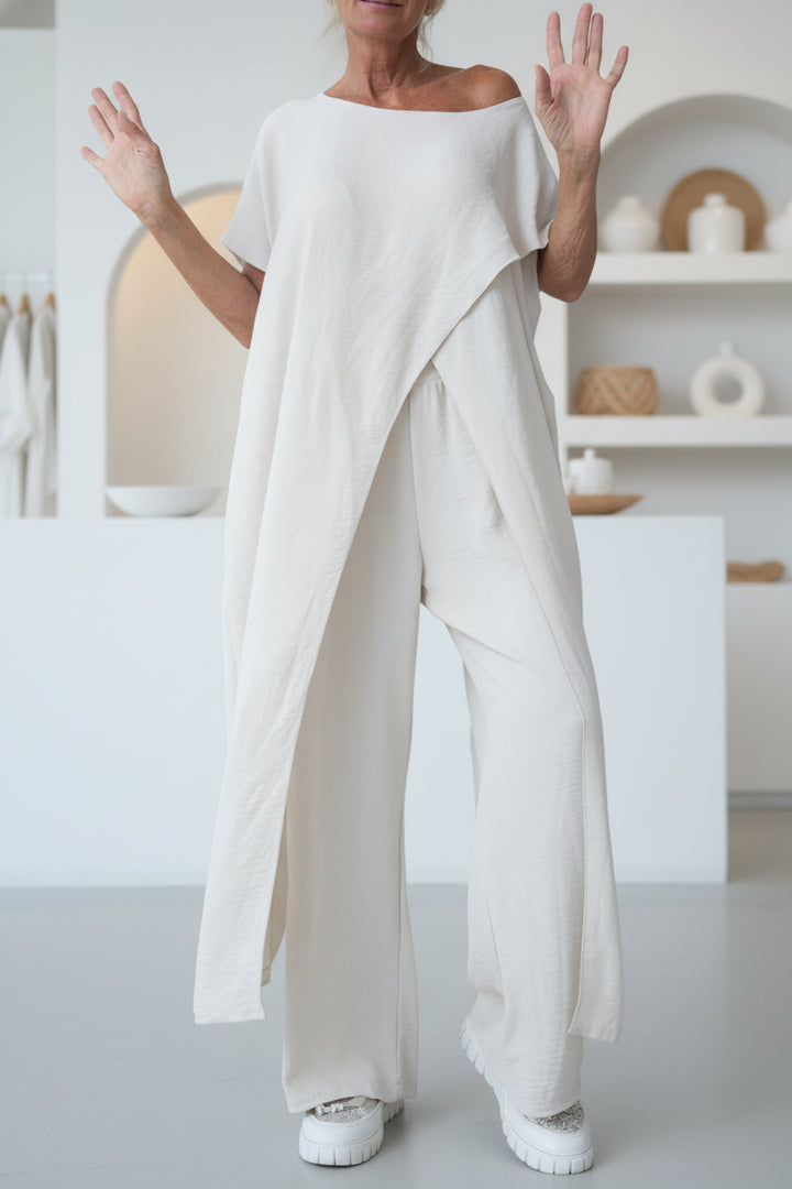 MEYA – ASYMMETRIC JUMPSUIT